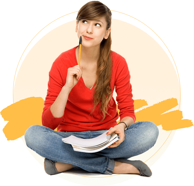 A young lady sits, holding a pen and a notebook.